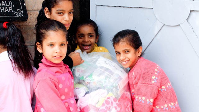 PHOTO: Orphan girls at Unique Home, in Jalandhar, India, receive goods donated thanks to a social-media campaign begun by Deesh Sekhon, of Abbotsford, B.C., in this undated photo.