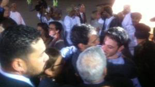 PHOTO: The US hikers freed from jail in Iran land in Oman and are greeted by their families, Sept. 21, 2011.