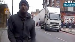 A man that attacked a British soldier in broad daylight reacts to the stabbing in a bystander video obtained by ITV, May 21, 2013.