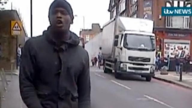 PHOTO: A man that attacked a British soldier in broad daylight reacts to the stabbing in a bystander video obtained by ITV, May 21, 2013.