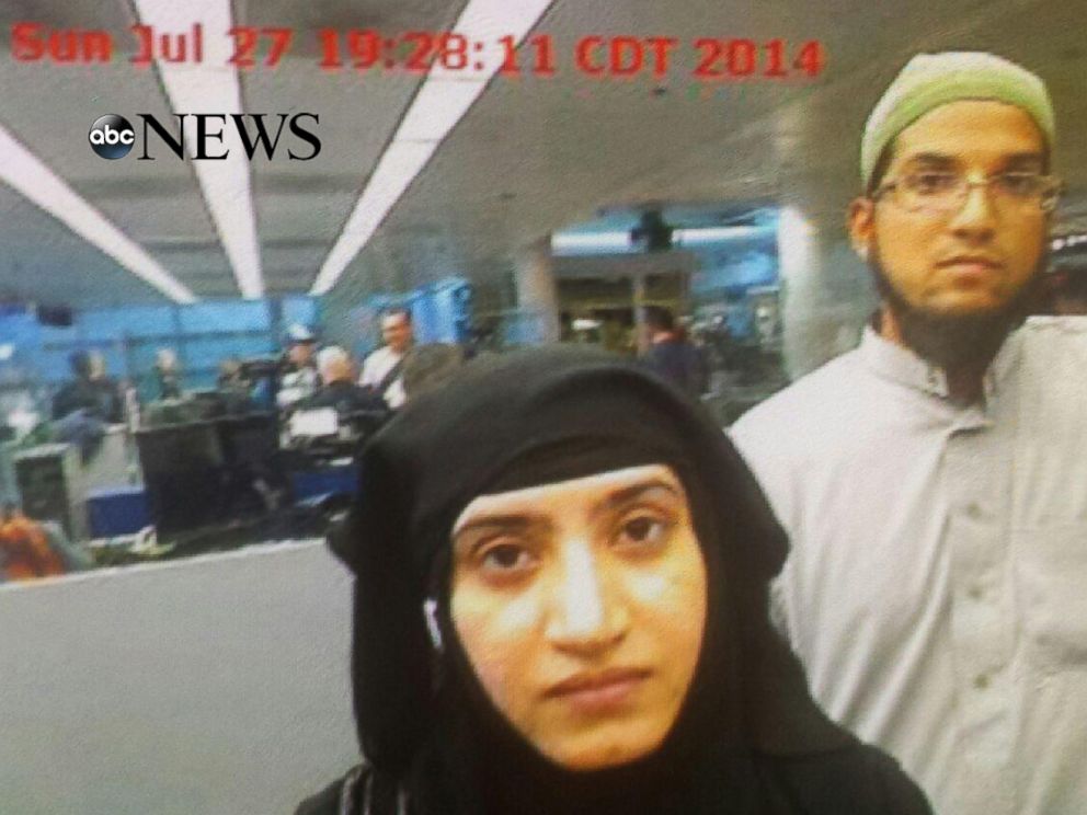 PHOTO: Photo obtained by ABC News shows Tashfeen Malik, center, and Syed Rizwan Farook, right, going through Chicagos OHare International Airport on July 27, 2014.