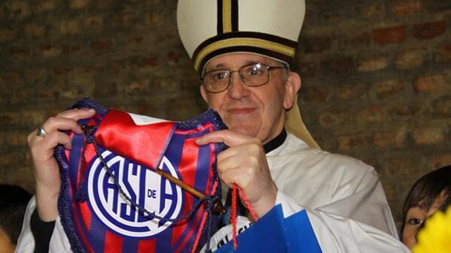 PHOTO: San Lorenzo de Almagro, a club named for a saint, posted on twitter a photo of Pope Francis years ago holding up a club flag, March 13, 2013.