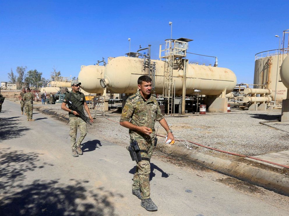 PHOTO: Members of Iraqi security forces are seen at an oil field in Dibis area on the outskirts of Kirkuk, Iraq, Oct. 17, 2017. 