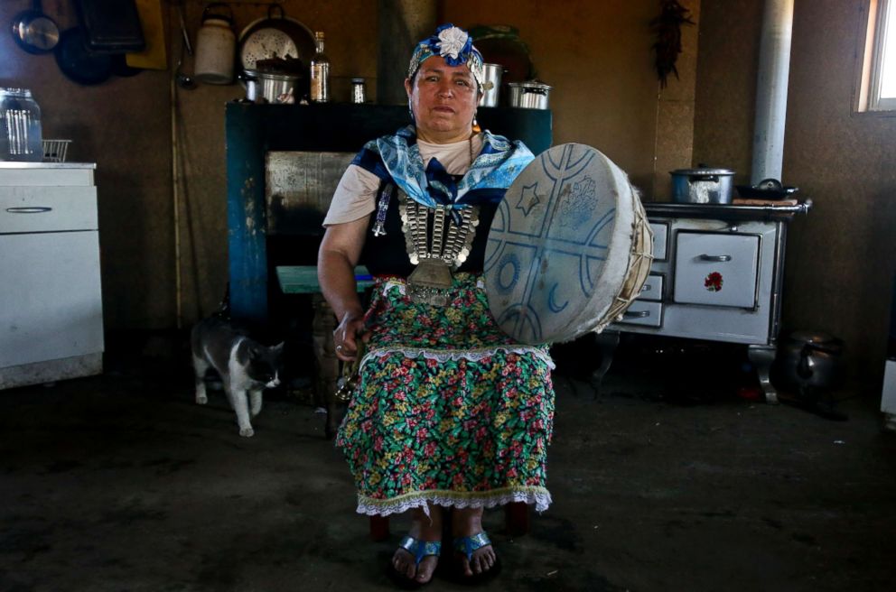 PHOTO: Kallfurayen Llanquileo, a Mapuche healer and religious leader known as a Machi, poses for a photo with her shaman drum at her home in the Mapuche community Enoco in Temuco, Chile, Jan. 8, 2018.