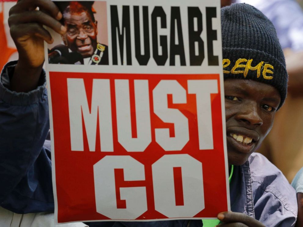 PHOTO: People gather at an opposition party rally outside the state parliament in before the proposed impeachment of president Robert Mugabe, Harare, Zimbabwe, Nov. 21, 2017.