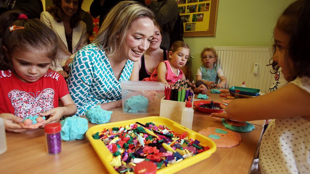 PHOTO: Kristina Schroeder playing with children