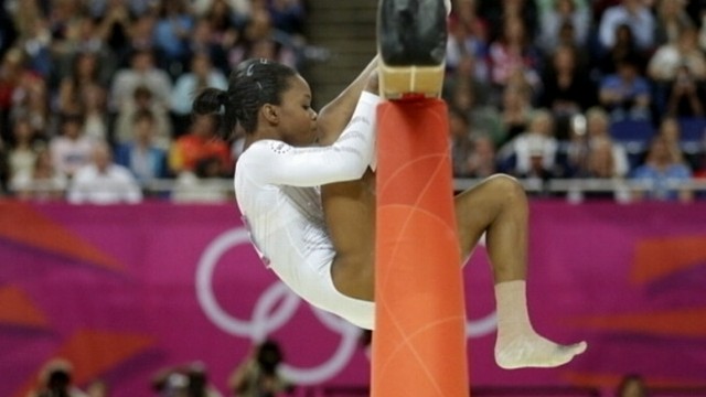 VIDEO: American gymnasts fall lands her in last place; teammate Aly Raisman earns bronze medal.