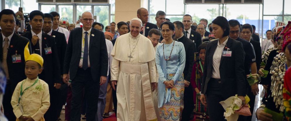 PHOTO: Pope Francis and Myanmars civilian leader Aung San Suu Kyi arrive during an event in Naypyidaw, Nov. 28, 2017.
