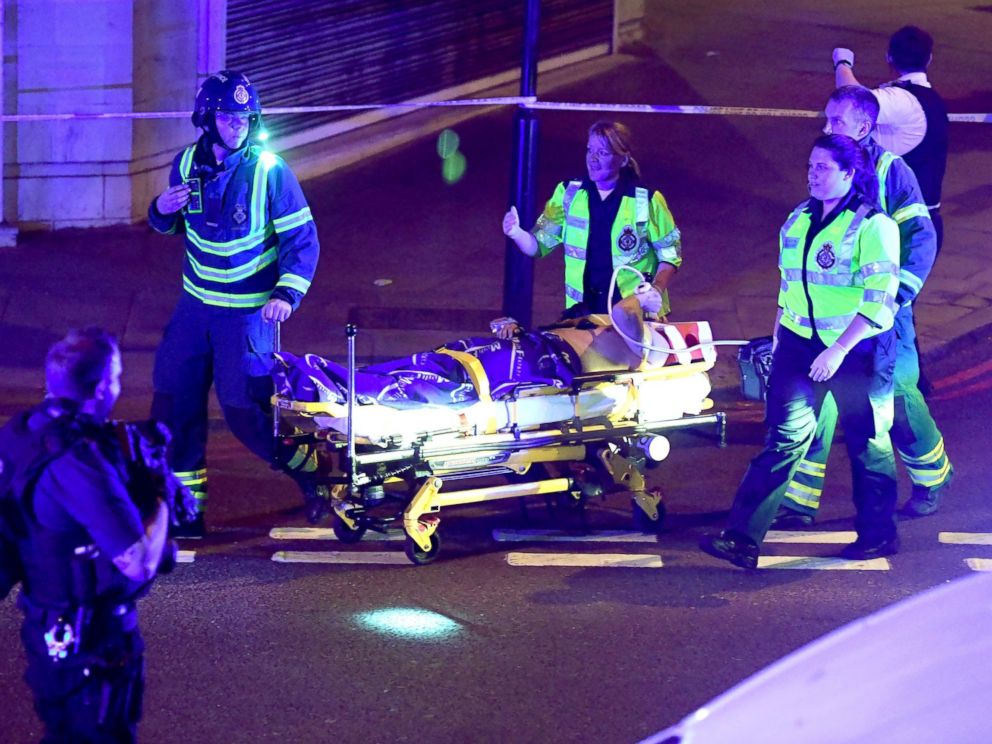PHOTO: First responders transport an injured person at the scene of a traffic incident in Finsbury Park, London, June 18, 2017.