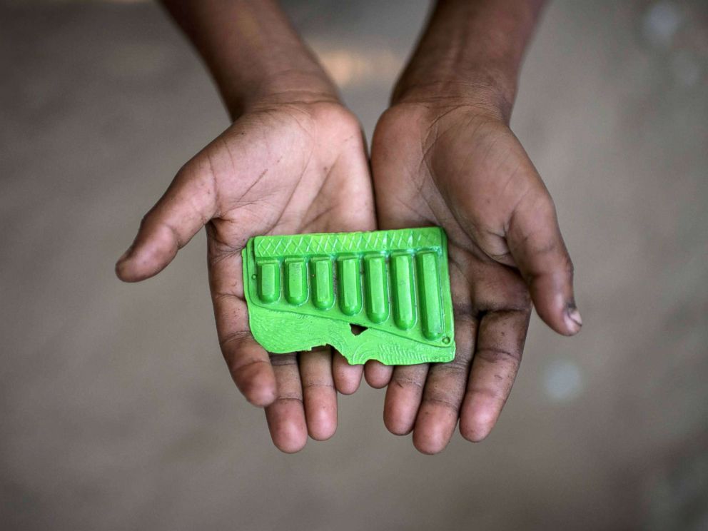 PHOTO: Rohingya migrant boy Mohammad Rafiq (8), who fled Myanmar in October, holds a toy whistle at the Shamlapur refugee camp in Coxs Bazar, Dec. 1, 2017.