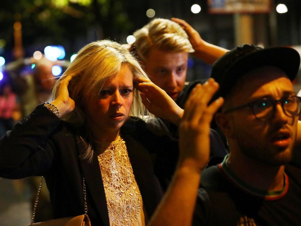 PHOTO: People leave the area with their hands up after an incident near London Bridge in London, Britain June 4, 2017.