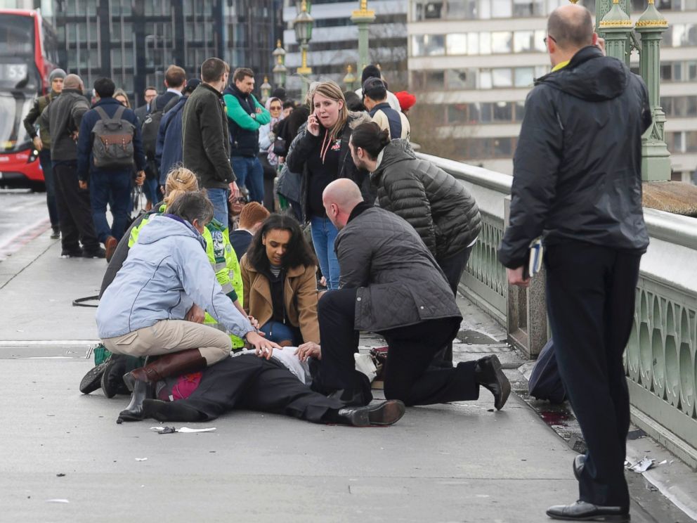 PHOTO: Injured people are assisted after an incident on Westminster Bridge in London, March 22, 2017.