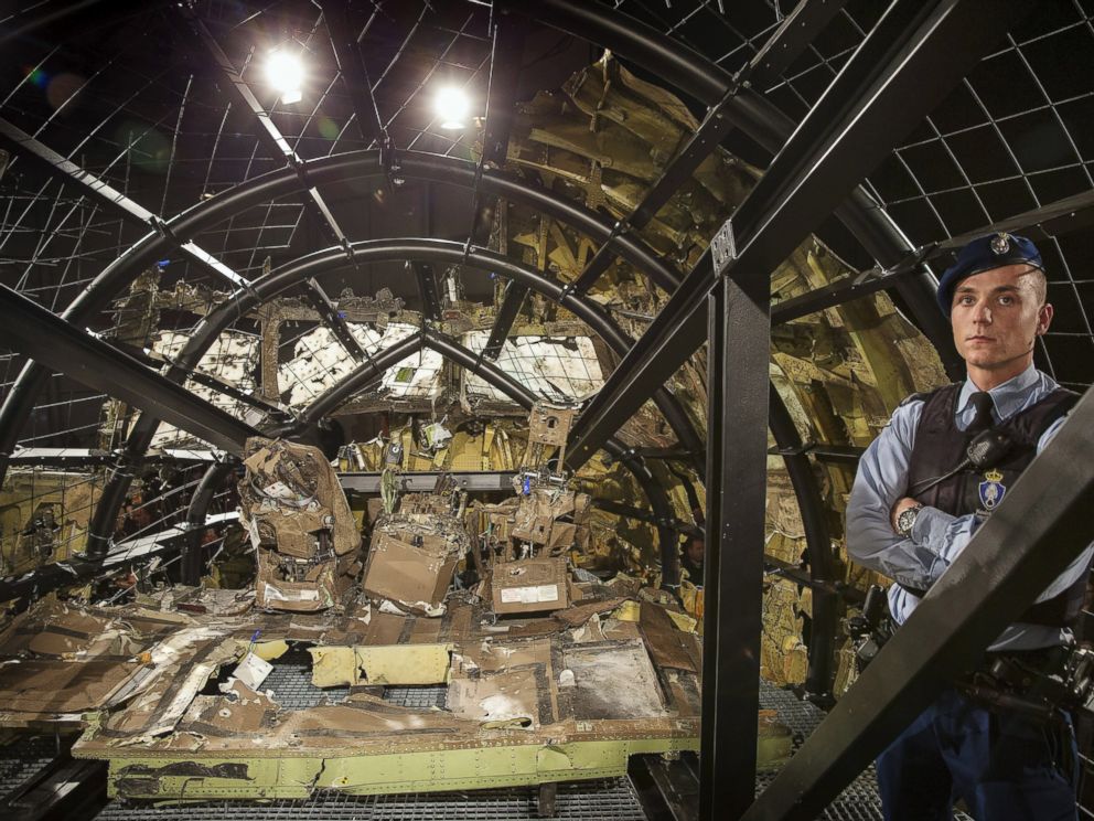 PHOTO: A military policeman stands guard in the cockpit of the MH17 airplane after the presentation of the final report into the 2014 crash, in the Netherlands, Oct. 13, 2015.