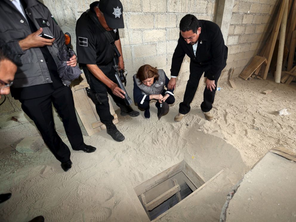 PHOTO: Mexicos Attorney General Arely Gomez Gonzalez looks into the entrance of a tunnel connected to the Altiplano Federal Penitentiary that was used by drug lord Joaquin El Chapo Guzman to escape on the outskirts of Mexico City, July 12, 2015.