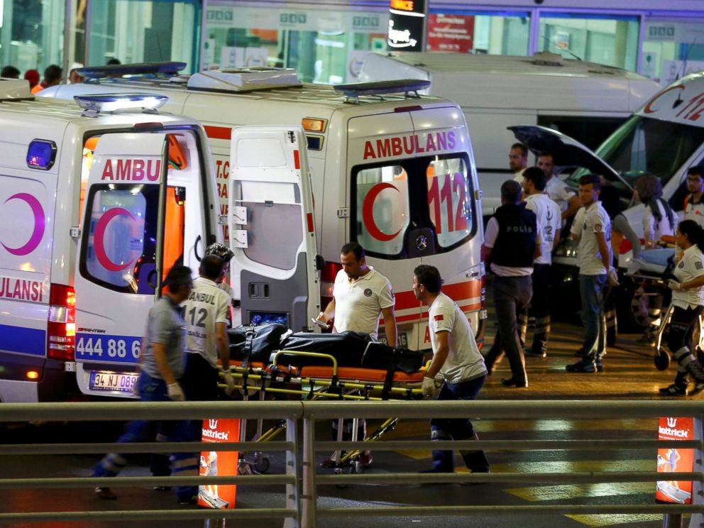 PHOTO: Paramedics push a stretcher at Turkeys largest airport, Istanbul Ataturk, Turkey, following a blast June 28, 2016.