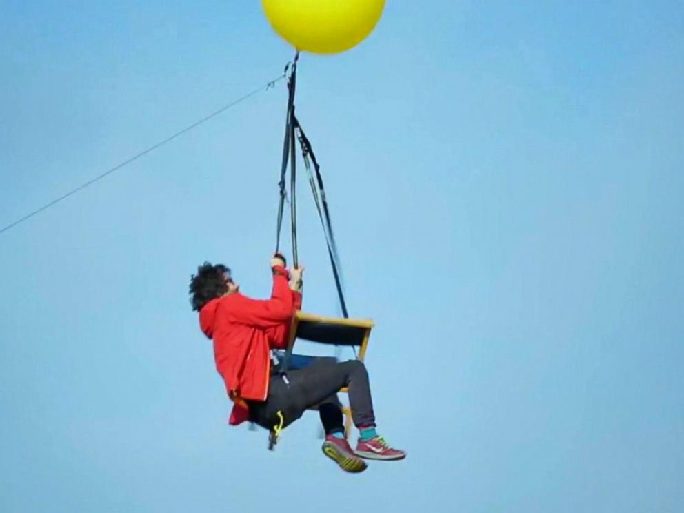 PHOTO: Tom Morgan, of Bristol, England, flew over South Africa attached to balloons in a stunt reminiscent of the animated movie Up.