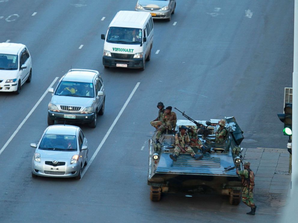 PHOTO: A military tank is seen with armed soldiers outside President Robert Mugabes office in Harare, Nov. 15, 2017.
