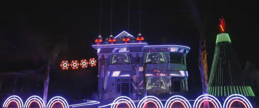 Matt Johnson, the owner of Living Light Shows in San Antonio, Texas, created this epic "Star Wars"-themed holiday light show on a house by a park downtown.
