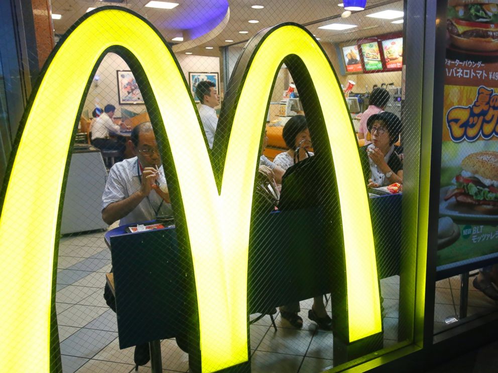 PHOTO: Customers have a meal at a McDonalds restaurant in Tokyo, July 22, 2014.