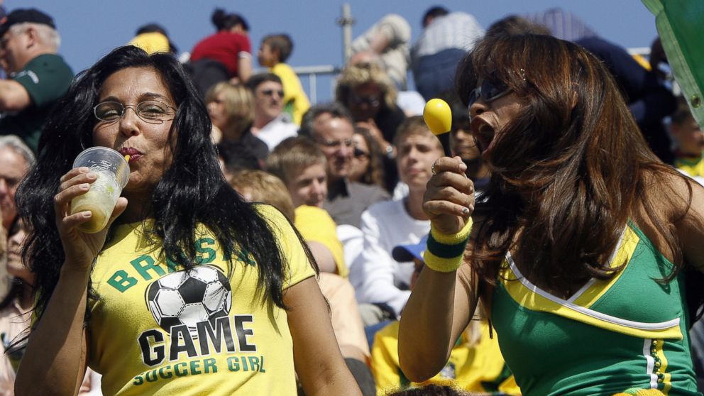 PHOTO: A Brazilian football fan enjoys a Caipirinha