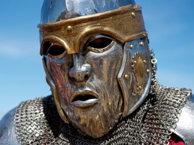 PHOTO: A member of the USA Knights team is seen wearing a face-like helmet shield during the International Medieval Combat championships at the castle of Belmonte, May 4, 2014, in Belmonte, Spain.