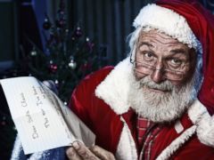 PHOTO: According to newspaper archives, kids who lived 100 years ago asked Santa for basic items such as food and shoes. Todays lists more often feature gadgets and toys.