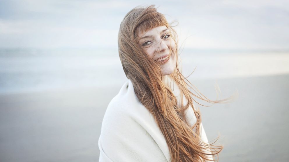 PHOTO: In this stock image, a woman with windswept hair is pictured.