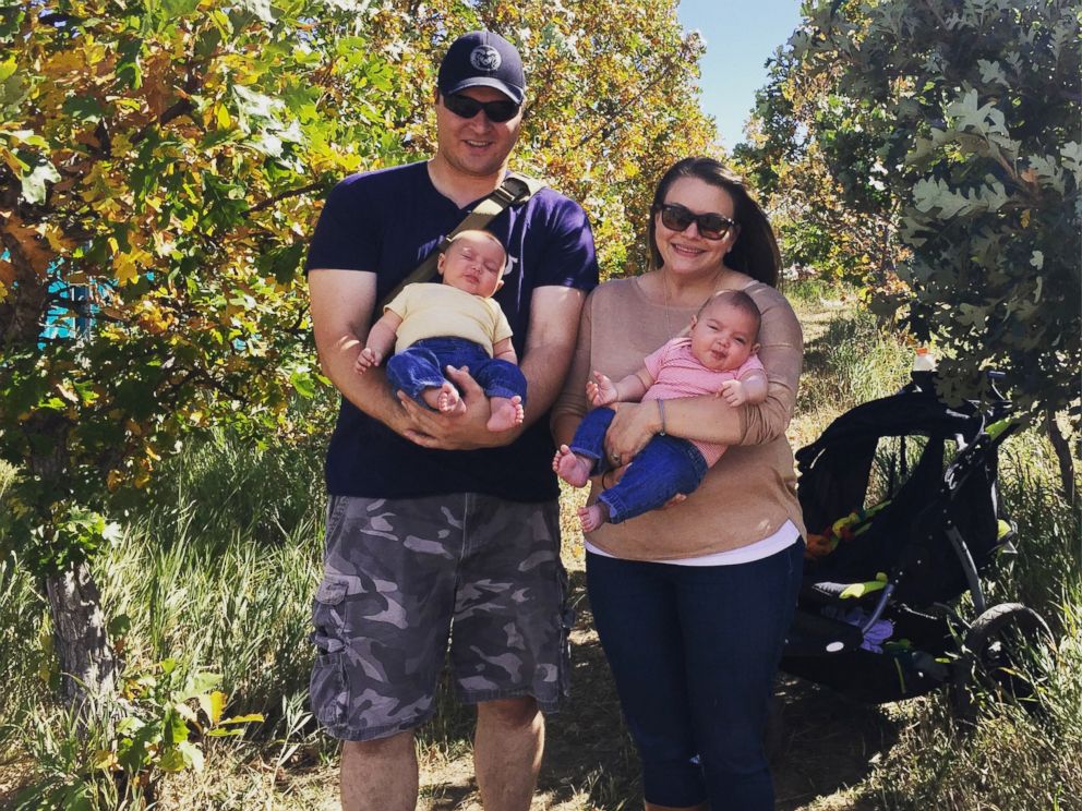 PHOTO: Chris Kawulok holds his son Liam and Liz Kawulok holds Luke in an undated photo.