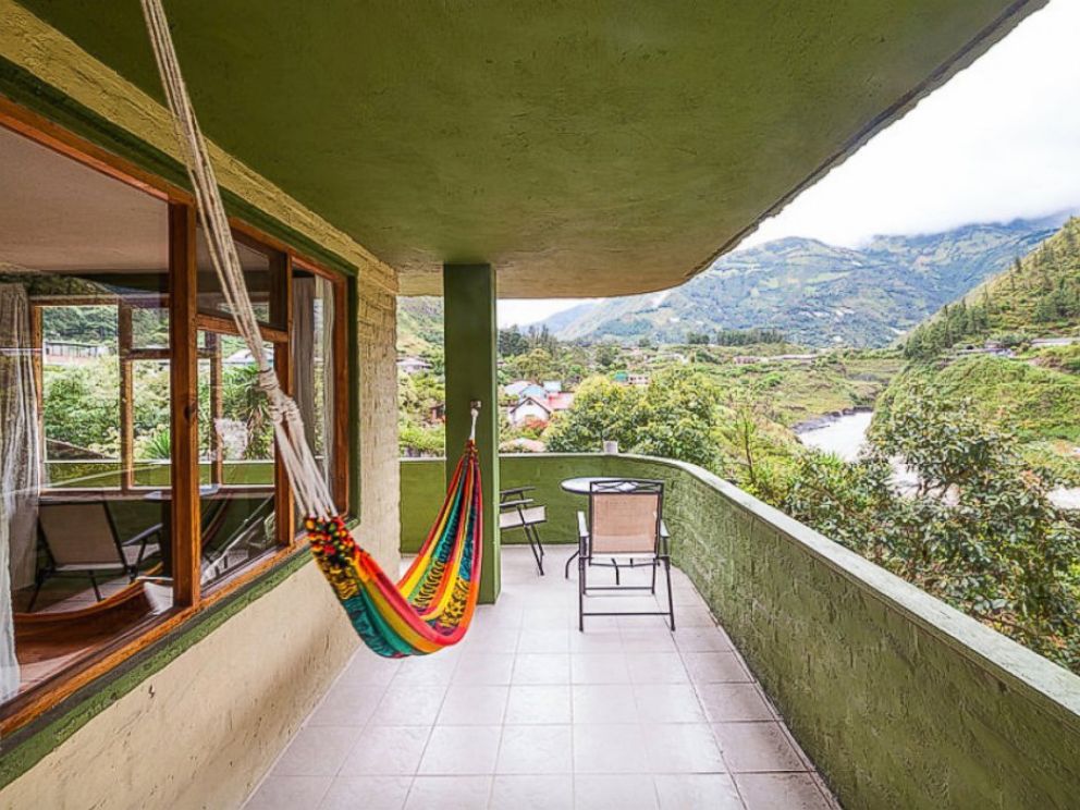 PHOTO: The second floor balcony of La Casa Verde overlooks the surrounding hills of Ecuador.