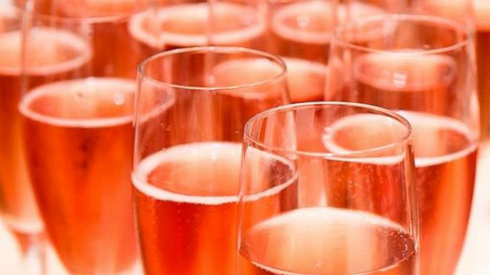 PHOTO: PAMA Pomegranate Liqueur gives a rosy glow to a glass of dry Riesling mixed with spices.