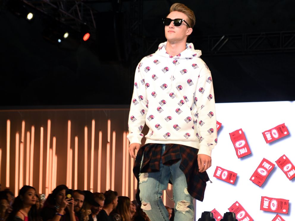 PHOTO: A model wears the Mens iconic Taco Bell logo hoodie sweatshirt.