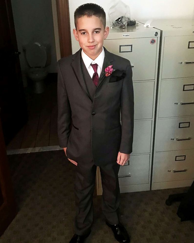 PHOTO: Jaydon Rabatin poses in his suit as the best man for his dads Nov. 12 wedding.