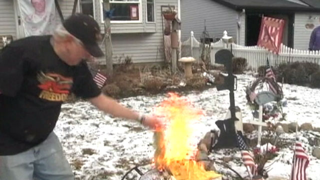 PHOTO: John Burri burned the New Jersey flag on his outdoor grill in protest.