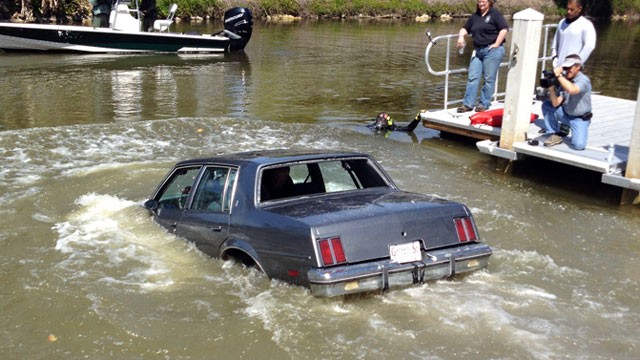 PHOTO: A demonstration in Naples, Florida of how to survive in a vehicle that gets into deep water.