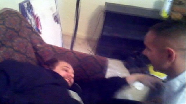 PHOTO: Brian Ecker being awakened by his brother.