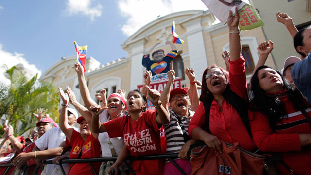PHOTO: Supporters of Venezuelas President Hugo Chavez chant slogans outside the National Assembly in Caracas, Venezuela, Jan. 5, 2013.