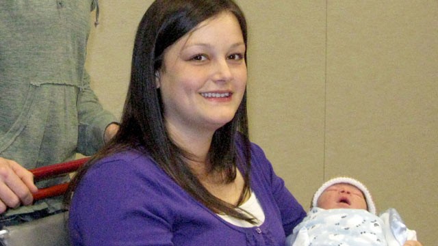 PHOTO: Luke and Katie Thacker pose for photos with their newborn son Blake in a conference room at St. Joseph Medical Center in Tacoma, Wash. on Jan. 18, 2012.