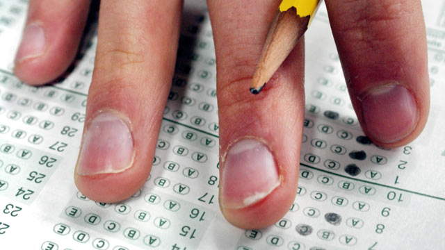 PHOTO: A student pauses while taking a sample SAT test during his prep class in Newton, Massachusetts in this March 3, 2005 file photo.