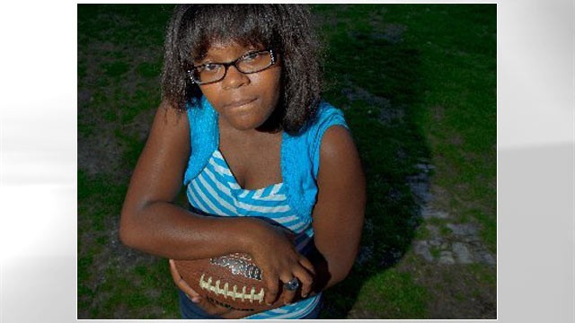 PHOTO: 11-year-old Kayla Johnson made waves this year as a right guard whose punishing blocking style earned her the nickname "Icebox" and disabused anyone in her path of the idea that girls aren't tough enough to roam the gridiron.