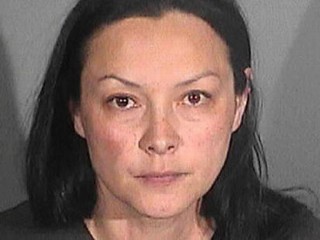 The Life of an Alleged Female Enforcer