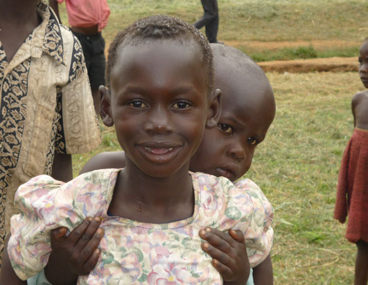 At the Awach IDP, an image far too familiar in Uganda -- children taking care of other children.
