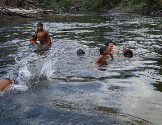 A pre-lunch swim for ABC News' Dan Harris and the tribal kids.
