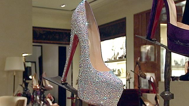 PHOTO:&nbsp;ABC News' Juju Chang measures the 7-inch heel on a crystal-covered Christian Louboutin, retailing at $5,995 at Bergdoff?s Goodman in New York City.