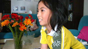 PHOTO After a seven year custody battle, Anna Mae starts a new life with her biological family in China.