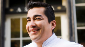 PHOTO Chef Jose Garces stands in front of Amada, the Philadelphia restaurant he named for his grandmother.