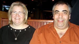 PHOTO Joe Amaral shares a drink with a friend.