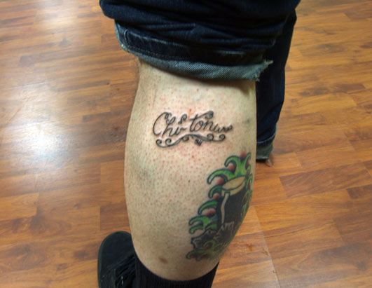 This is Luke Clifford with a Chi-Tonw tattoo on his calf.