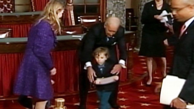 VIDEO: The vice president playfully tussles with a senator's child during swearing in.