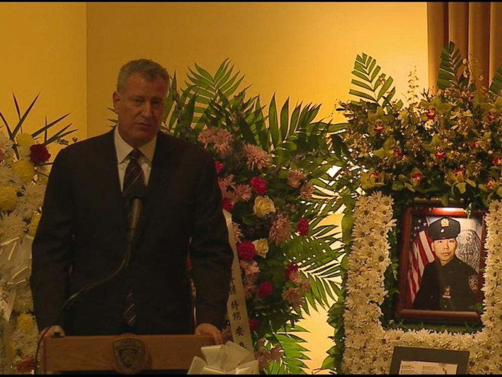 PHOTO: Mayor Bill De Blasio delivers remarks at the funeral for New York City police officer Wenjian Liu on Sunday, Jan. 4, 2015.