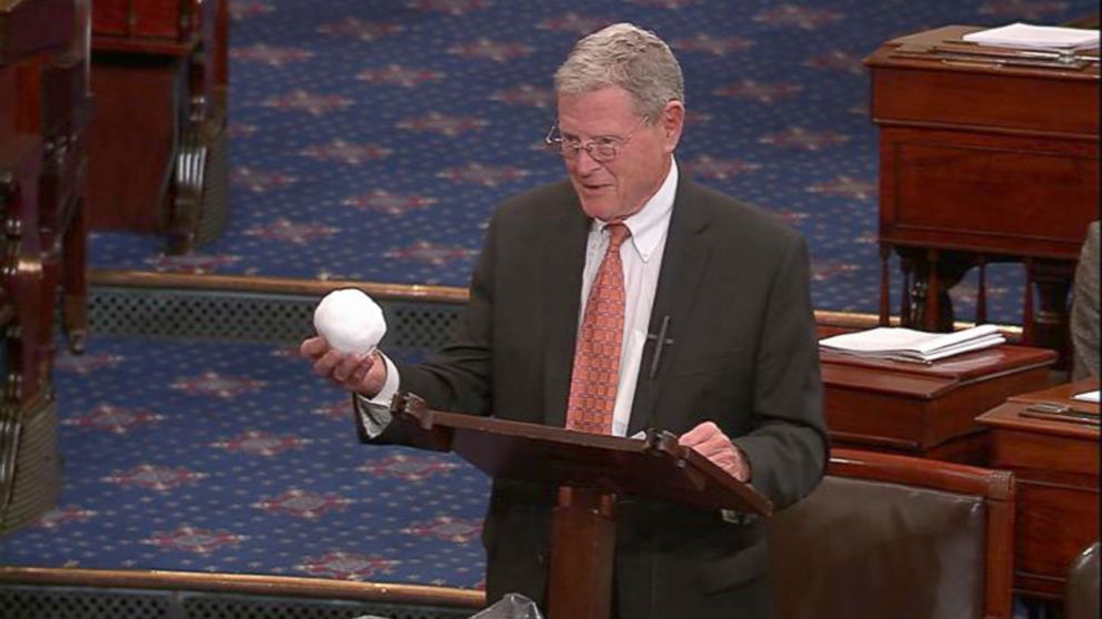 PHOTO: Sen. Jim Inhofe, R-Oklahoma, throws a snowball on the Senate floor.